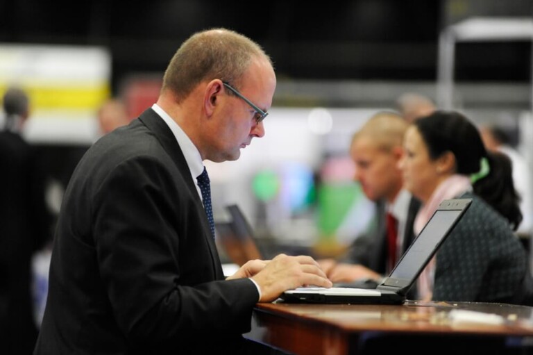 Businessman checking laptop by Glasgow conference and event photographers Blink Imaging Businessman checking laptop by Glasgow conference and event photographers Blink Imaging