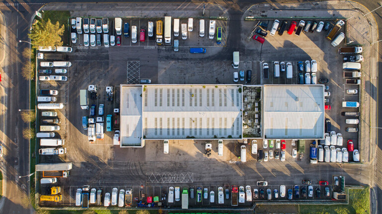 Aerial View looking down at Van Servicing Depot by 7. Glasgow Drone Photographers Blink Imaging Aerial View looking down at Van Servicing Depot by 7. Glasgow Drone Photographers Blink Imaging