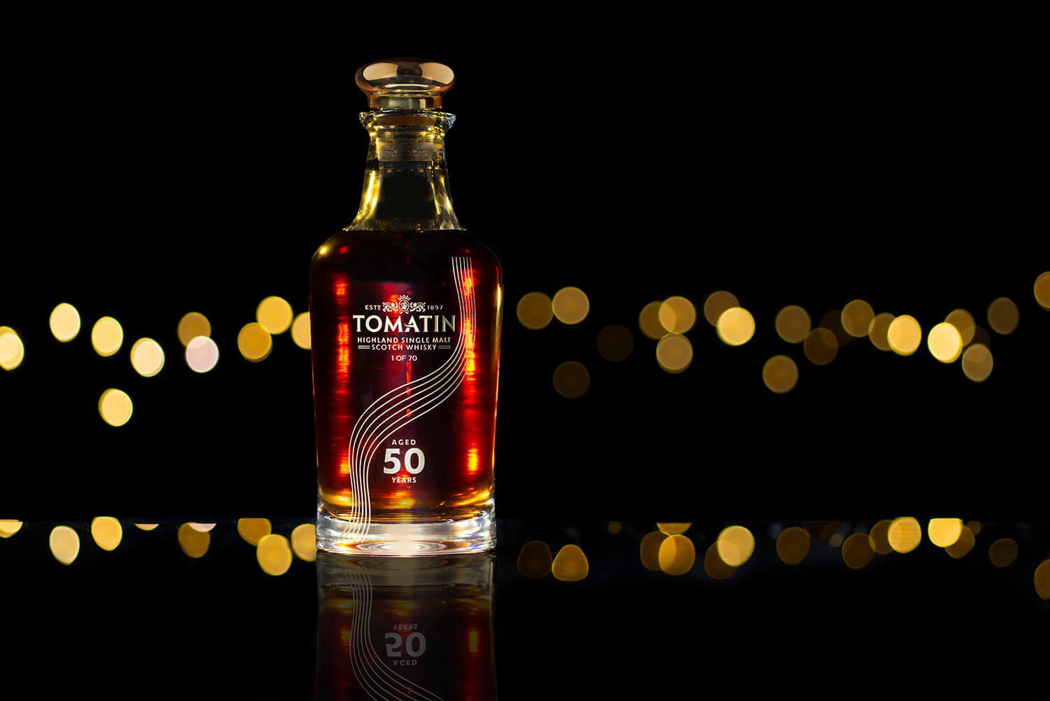 The background lights were shot live in the studio with the bottle in place for positioning although for the completed shot the bottle was shot separately.