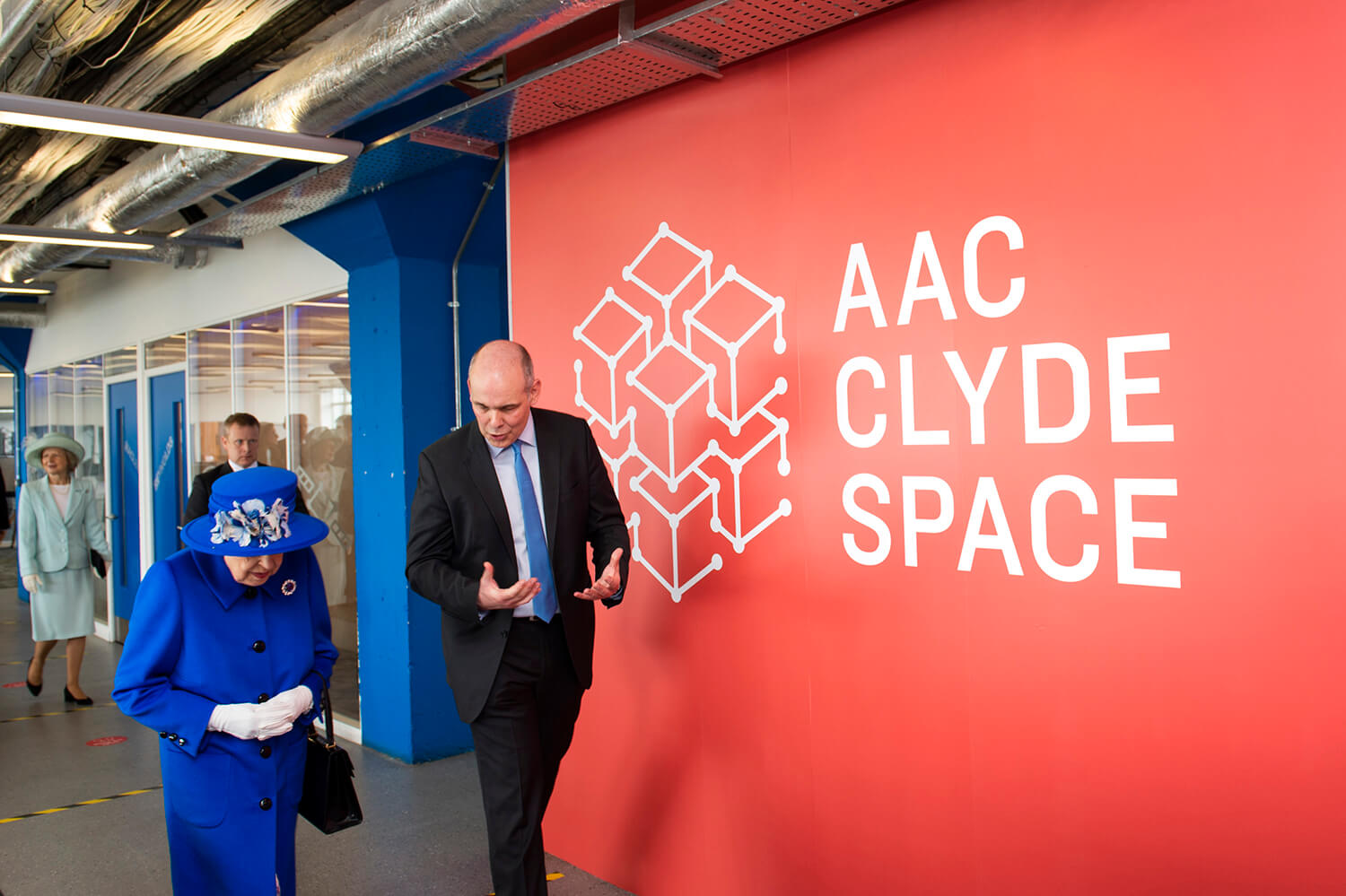 Queen visiting a business in Glasgow.