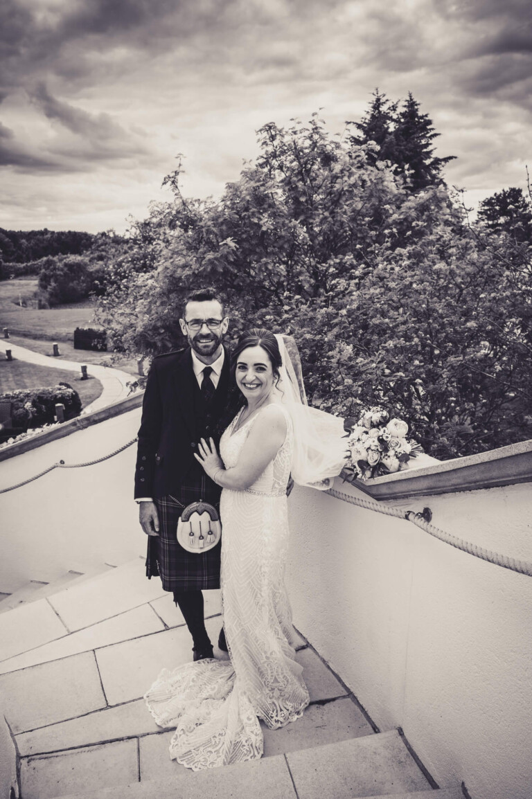Bride and groom relaxing at Gailes Hotel by Glasgow wedding photographer Richard Campbell
