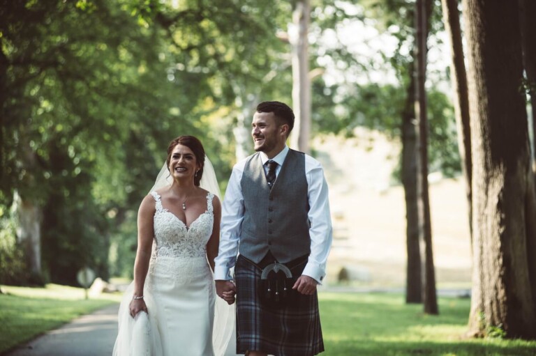 Natural shot of bride and groom walling at Enterkine House Hotel by Glasgow wedding photographers Rihard Campbell Photography