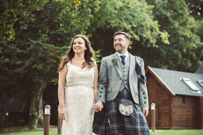Bride and groom wlaking at Cornhill House Hotel by Glasgow wedding photographers Rcihard Campbell Photography