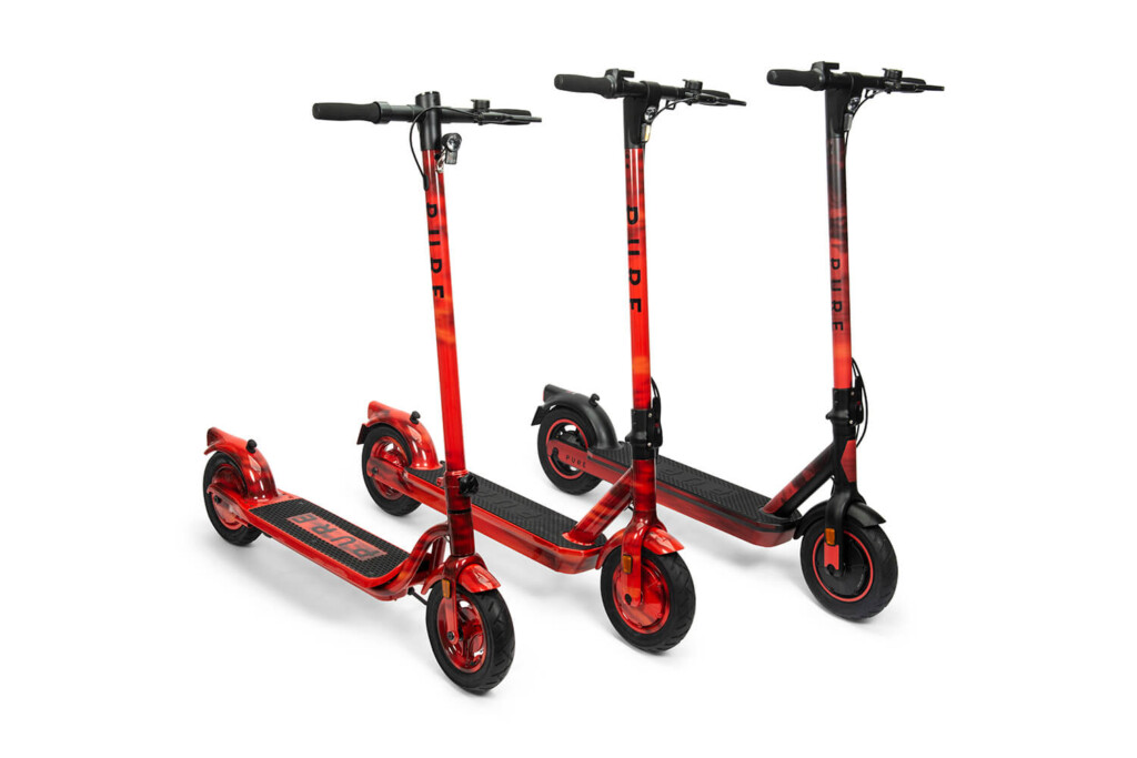 Product photography of 3 Pure Electric scooters